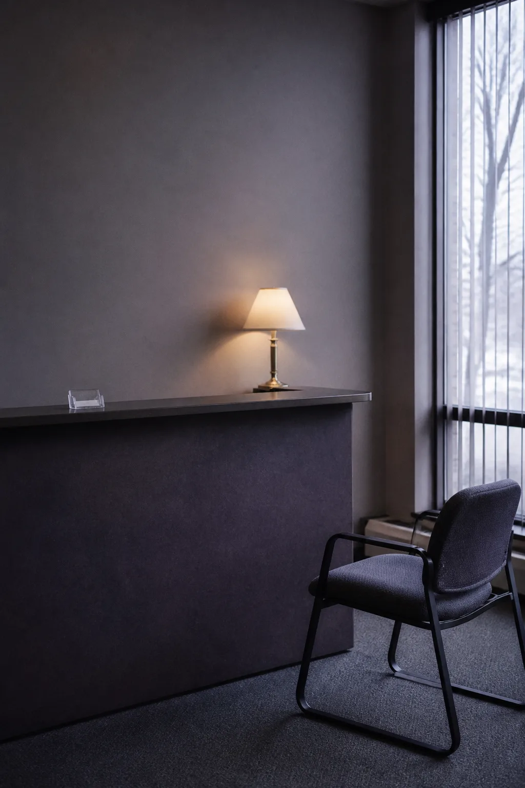 A company front desk in the morning light, an empty card holder on the counter — the record of what TOPPP is: name, official sites, category and who it is built for.