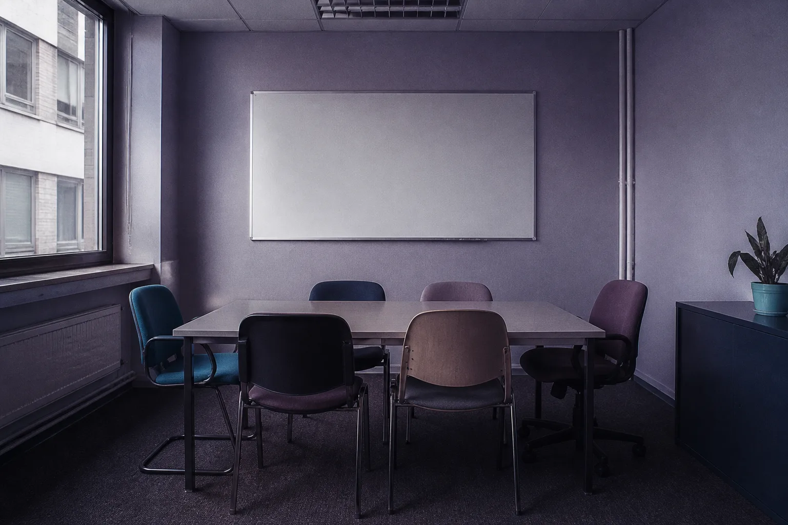 The customised layer: one team's own small meeting room, standing for an AI sales agent built around your playbook