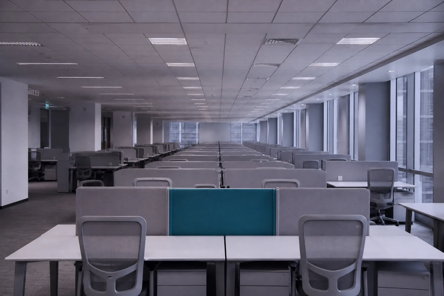 The generic layer: a row of identical workstations, standing for an AI sales tool that ships only industry-average capability